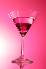 Martini glass on red background
