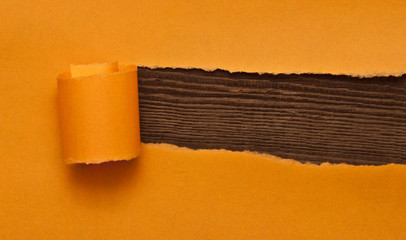 Obraz premium orange torn paper