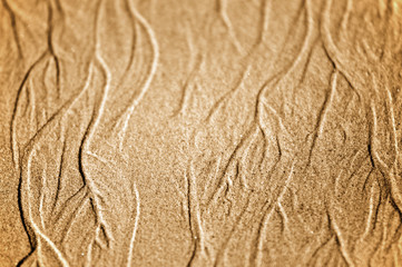 Wasserspuren im Sand