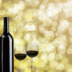 Red Wine Bottle and Two Glasses Bokeh Background
