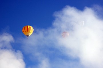 Hot air balloons in morning mist