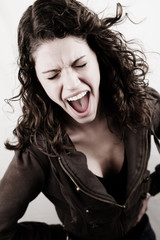 screaming frustrated attractive young girl