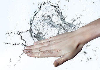woman hand in water splash