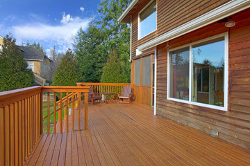 Back of the house with deck
