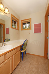 Small bathroom with blue chair