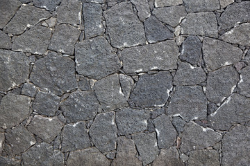 typical wall made seamless from volcanic stone