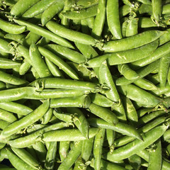 Fresh green peas closeup, background