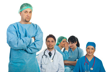 Surgeon man and gossip colleagues