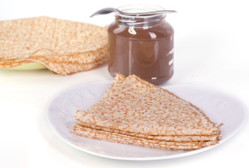 assiette de crêpes et chocolat fondu