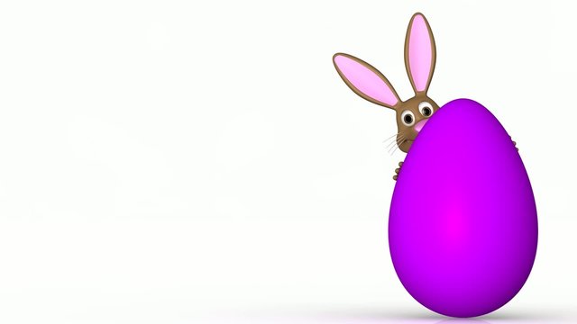 easter bunny peers from behind an easter egg