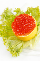 Caviar served on fresh lemon