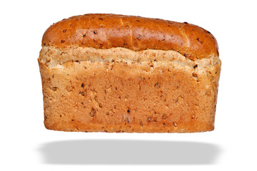 Loaf of granary bread isolated on awhite background.