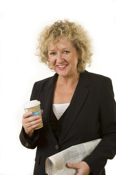 middle agend business female with coffee to go and newspaper