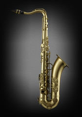 Obraz premium single tenor saxophone on dark wall background