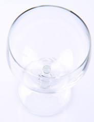 Empty wine glass on white background