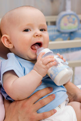 baby drinking milk © mbt_studio