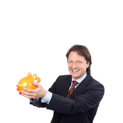 zufriedener geschäftsmann mit sparschwein