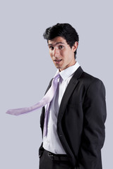 Businessman with a flying necktie
