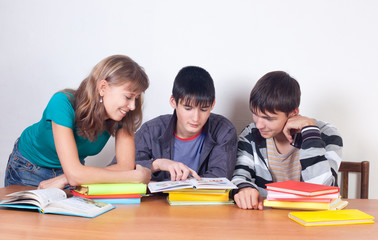 Three students with books