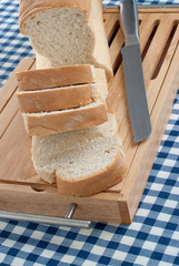 Slices of bread on top of wooden board