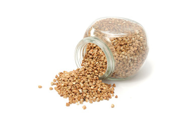 Buckwheat in Glass Jar Isolated on White Background