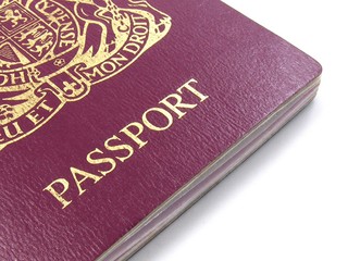 A close up of a British passport on a white background