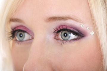 woman's eyes with creative make-up