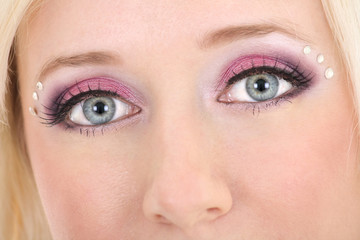 woman's eyes with creative make-up