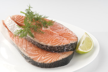 Raw salmon steak with herbs