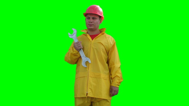 Builder spins with wrenches on the Green Screen LOOP