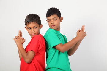 Two duelling playful school mates