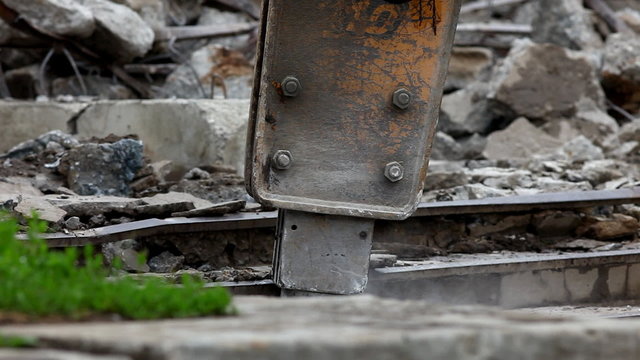 tractor with paving breaker destroy  stair