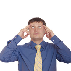 Businessman with a big headache, looking up. Isolated on white