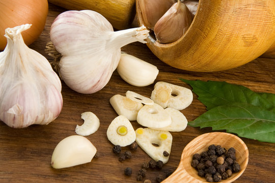 garlic nutrition and healthy food on wood