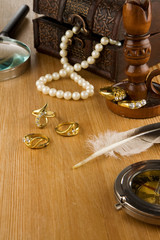 old fashioned jewels and feather