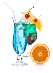 Two tropical cocktails and orange