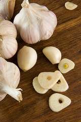 set of garlic on wooden texture