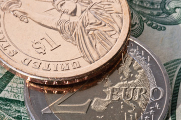 Dollar and Euro Coins in Detail