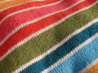Woolen mohair colorful striped textile texture close up.