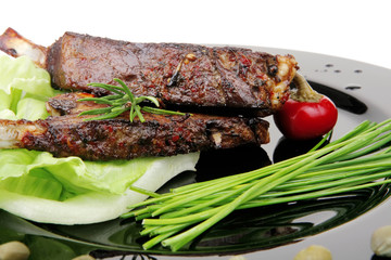 savory plate: grilled ribs over black