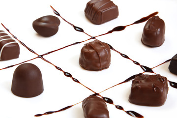 Chocolates on squares