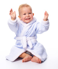 Cute child in bathrobe