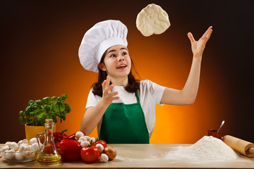 Girl making pizza dough
