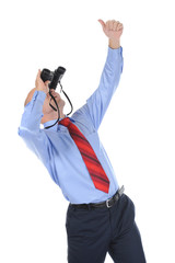 Businessman looking through binoculars