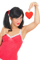 beauty girl with red heart-shaped pepper