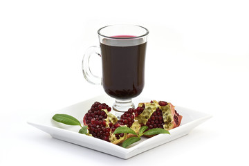 Pomegranate and garnet juice in a glass