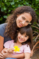 Portrait of a joyful mother with her daughter