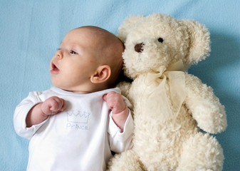 baby and teddy bear
