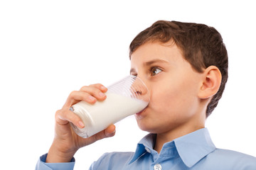 Boy drinking a glass of milk