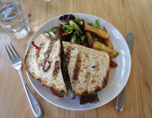 Veggie Sandwich with side salad and fries